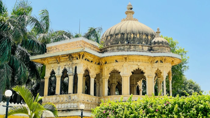 a building with a dome and columns